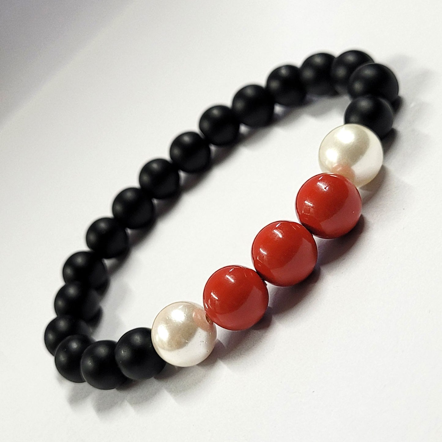 Red And White Shell Pearls 10mm Bracelet With 8mm Black Beads